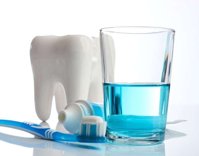 image of a toothbrush and mouthwash in wilmington ma
