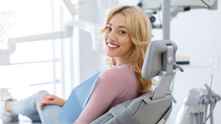 woman at her dentist in wilmington ma
