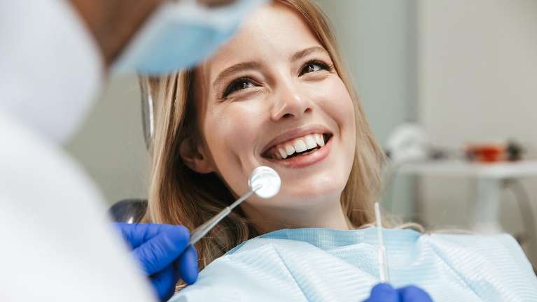 woman at the dentist in wilmington 